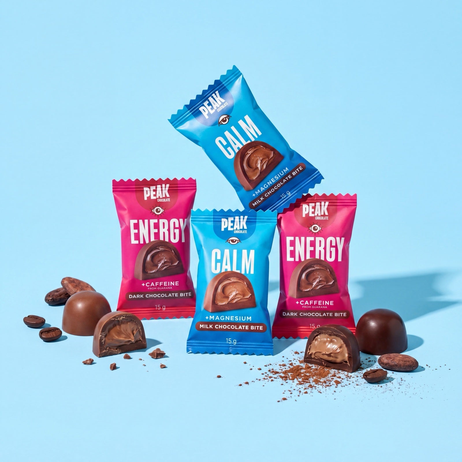 Peak Chocolate Calm and Energy single-bites on a blue backdrop