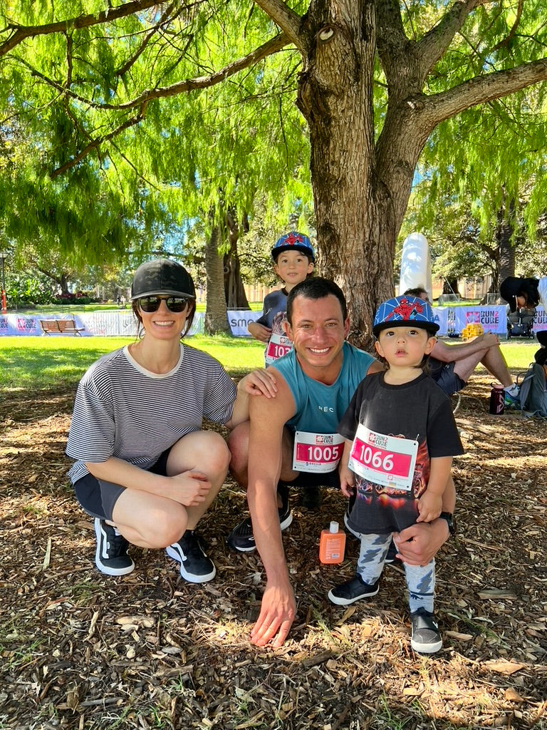 Raph and Elisa with their kids at a family fun-run